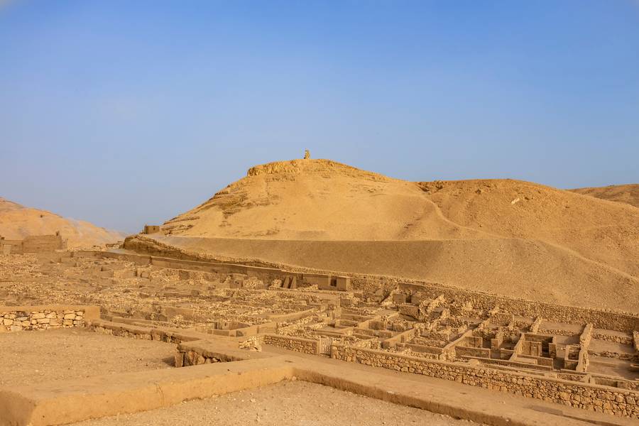 Deir el-Medina, the walled village of the tomb workers who staged the first recorded strike.