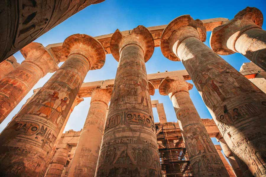 The Great Hypostyle Hall at Karnak, a forest of stone columns carved to mimic papyrus stalks.